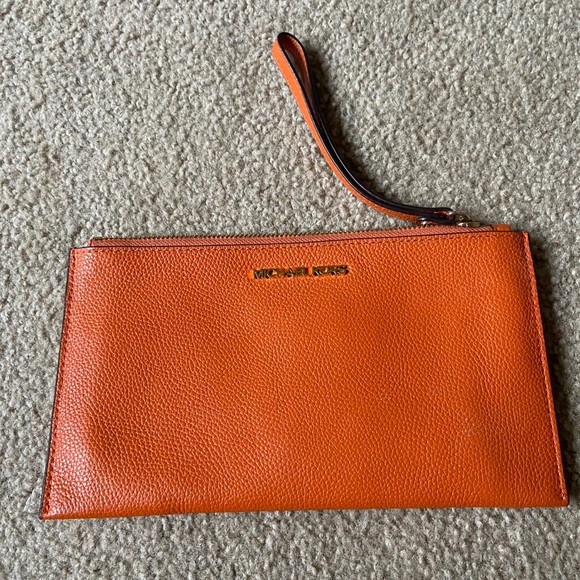 Michael Kors Accessories - Michael Kors orange zip clutch